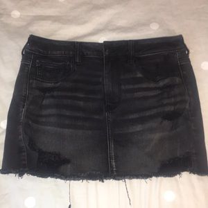 distressed black denim skirt